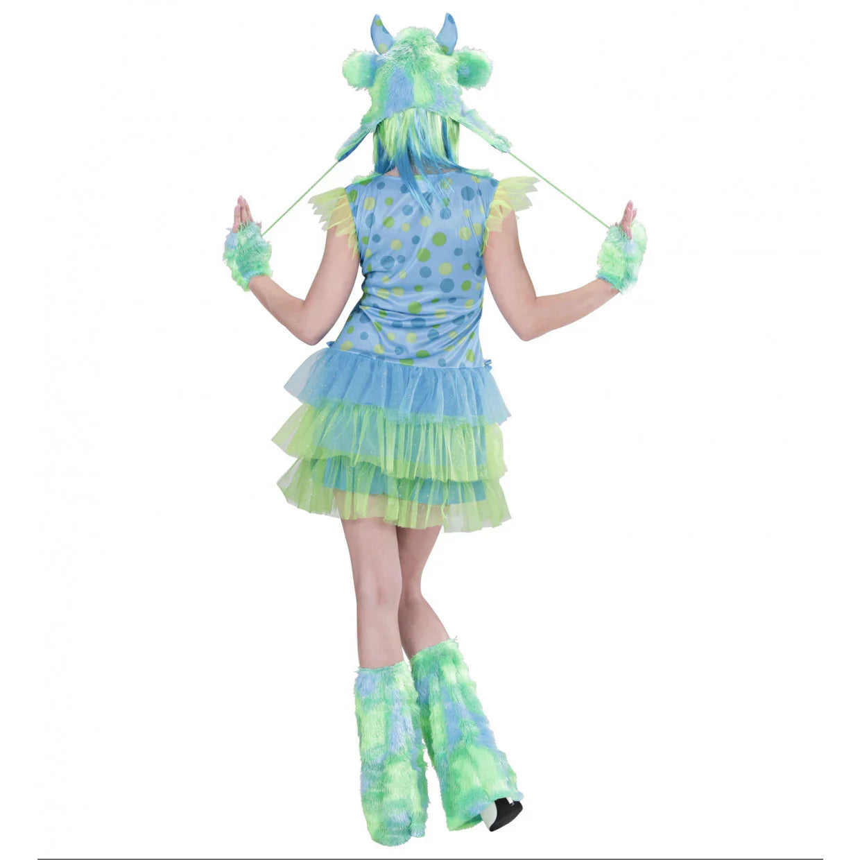 Meisje in blauwe en groene monster verkleedjurk met stippen en pluizige accessoires