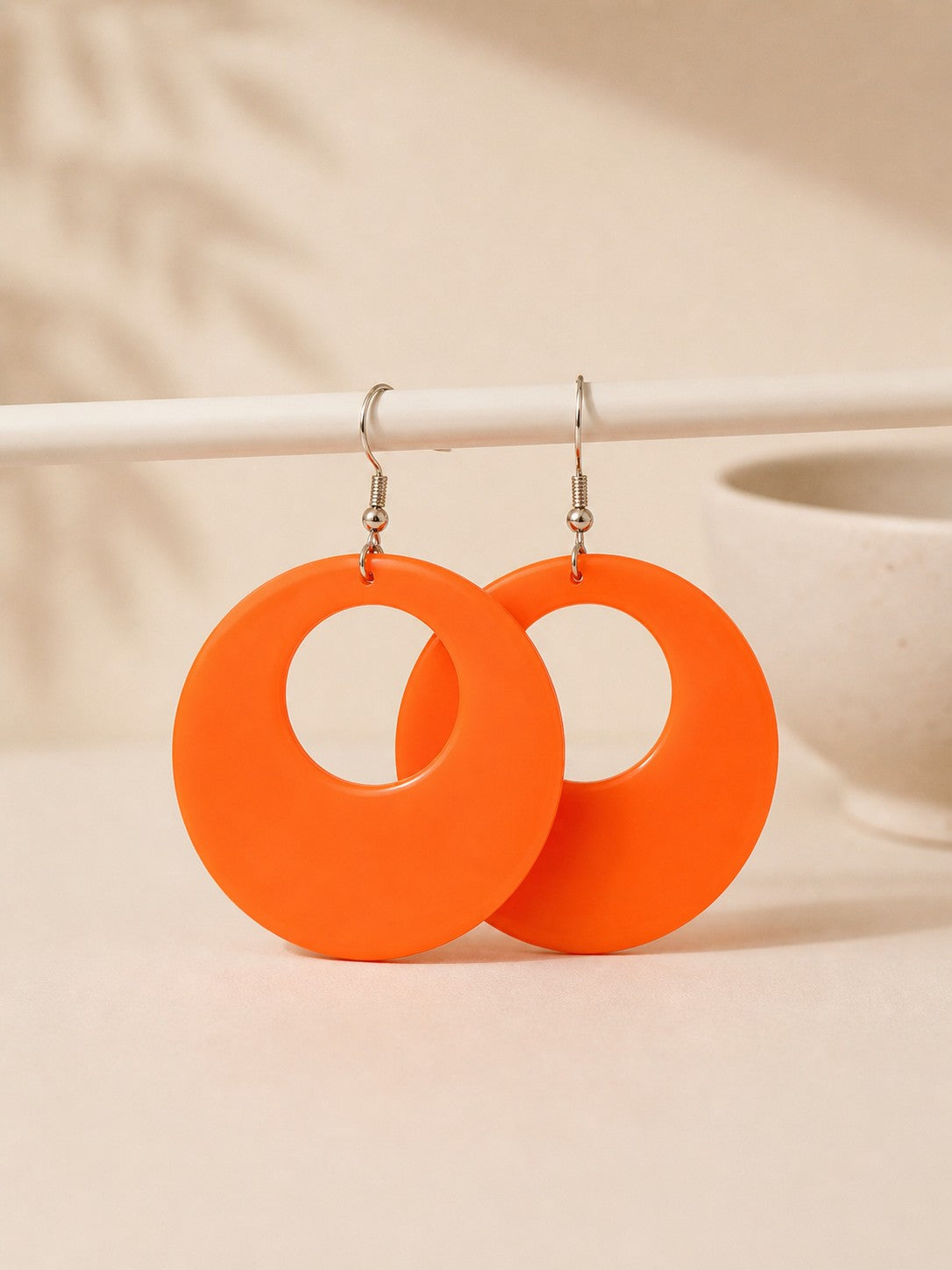 Oranje oorbellen neon productfoto
